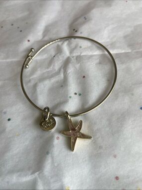 Dune Silvertone Starfish bangle with charm that says handmade in USA